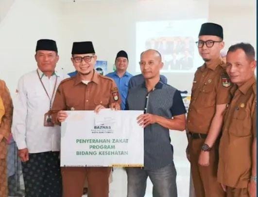 Wawako dan Baznas Salurkan Zakat untuk 61 Mustahik Bukittinggi